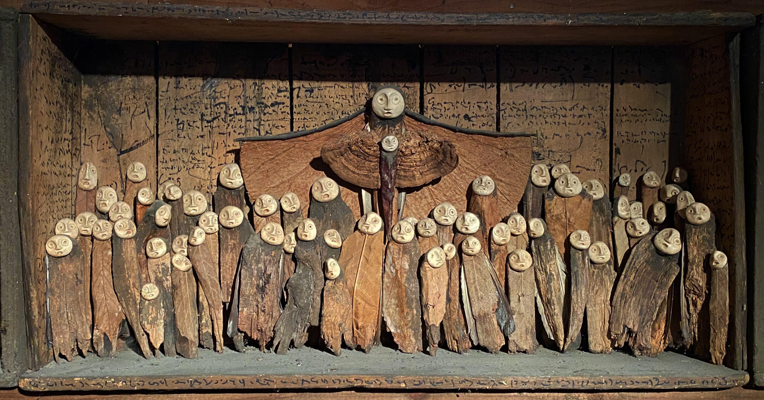 Un tableau de Jephan de Villiers empli des petits personnages du peuple d'Arbonie